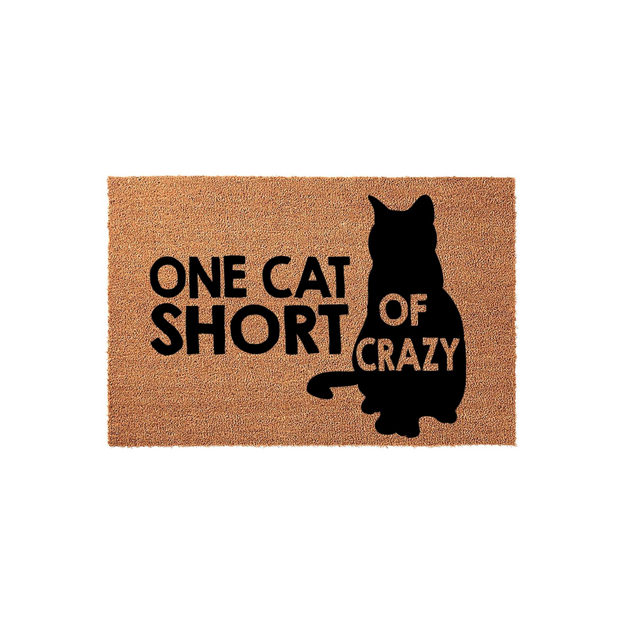 Funny Cat Lover Doormat featuring a natural coir texture and a bold black silhouette of a sitting cat, with the humorous text One Cat Short Of Crazy printed in a clean, modern font across the center of this durable outdoor
