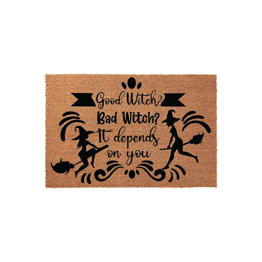 Funny Halloween coir doormat featuring the text Good Witch Bad Witch It depends on you with black silhouettes of two witches flying on broomsticks, creating a playful and festive entryway decor piece for the spooky fall season.