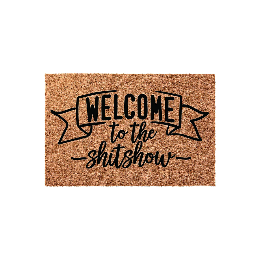 Funny Welcome to the Shitshow coir doormat featuring bold black typography centered on a natural brown coconut fiber mat, providing a humorous and welcoming touch to your front porch entryway decor for guests arriving at your