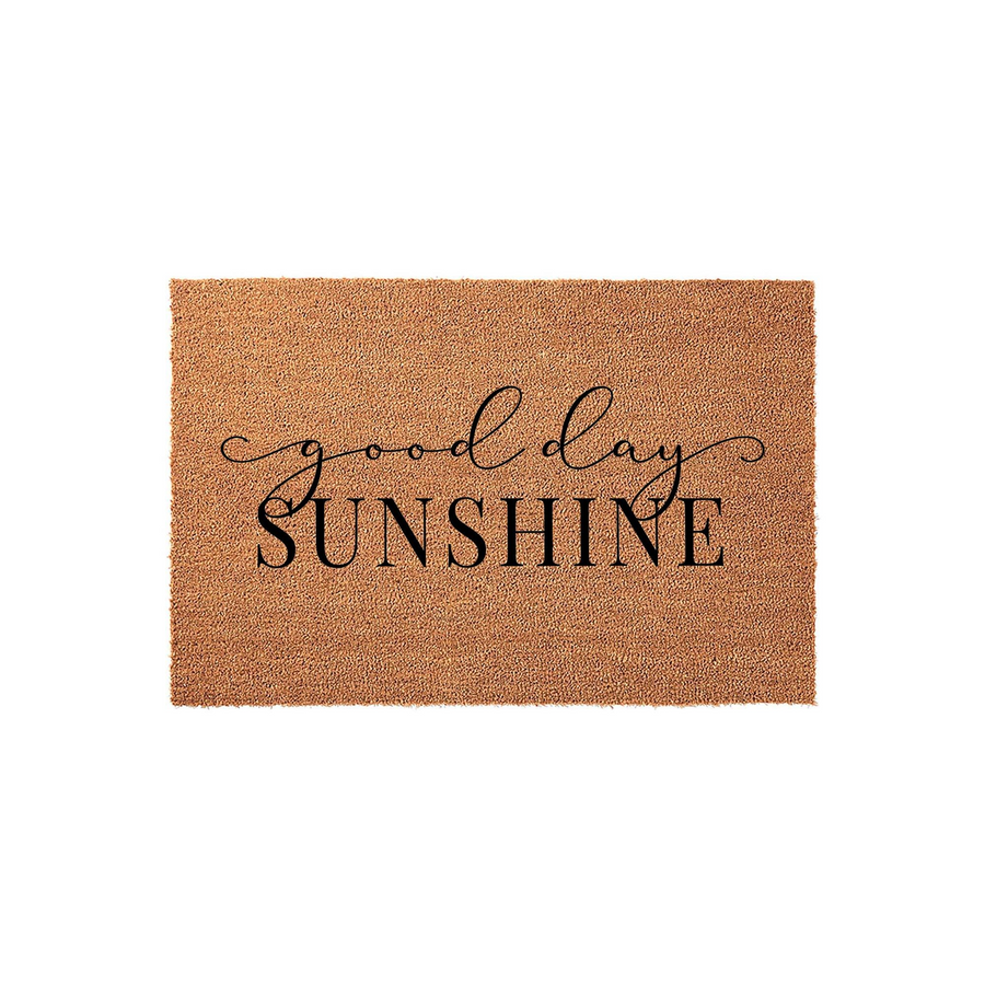 Good Day Sunshine coir doormat featuring a natural brown fiber texture and elegant black typography, providing a cheerful and welcoming entrance decor piece for your front porch or home entryway on a clean white background.