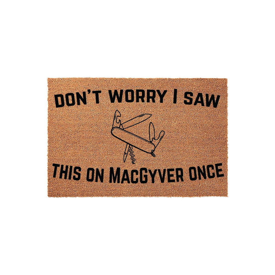 Funny MacGyver doormat featuring a natural coir texture and a black printed illustration of a multi-tool pocket knife, with the humorous text Don't Worry I Saw This On MacGyver Once centered on a plain white studio background.