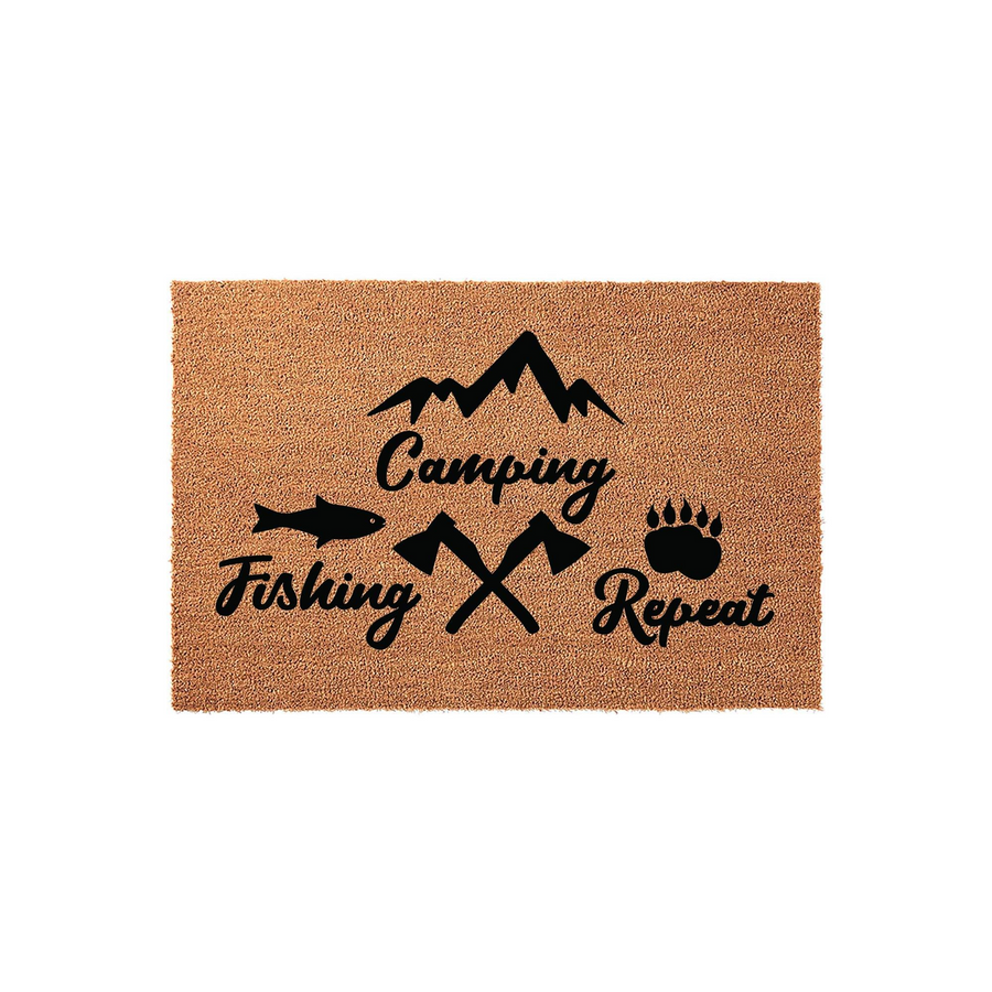 Camping Fishing Repeat outdoor doormat featuring a natural coir texture with black printed graphics of mountains, a fish, crossed axes, and a bear paw print, creating a rustic aesthetic for any cabin or home entrance for outdoor