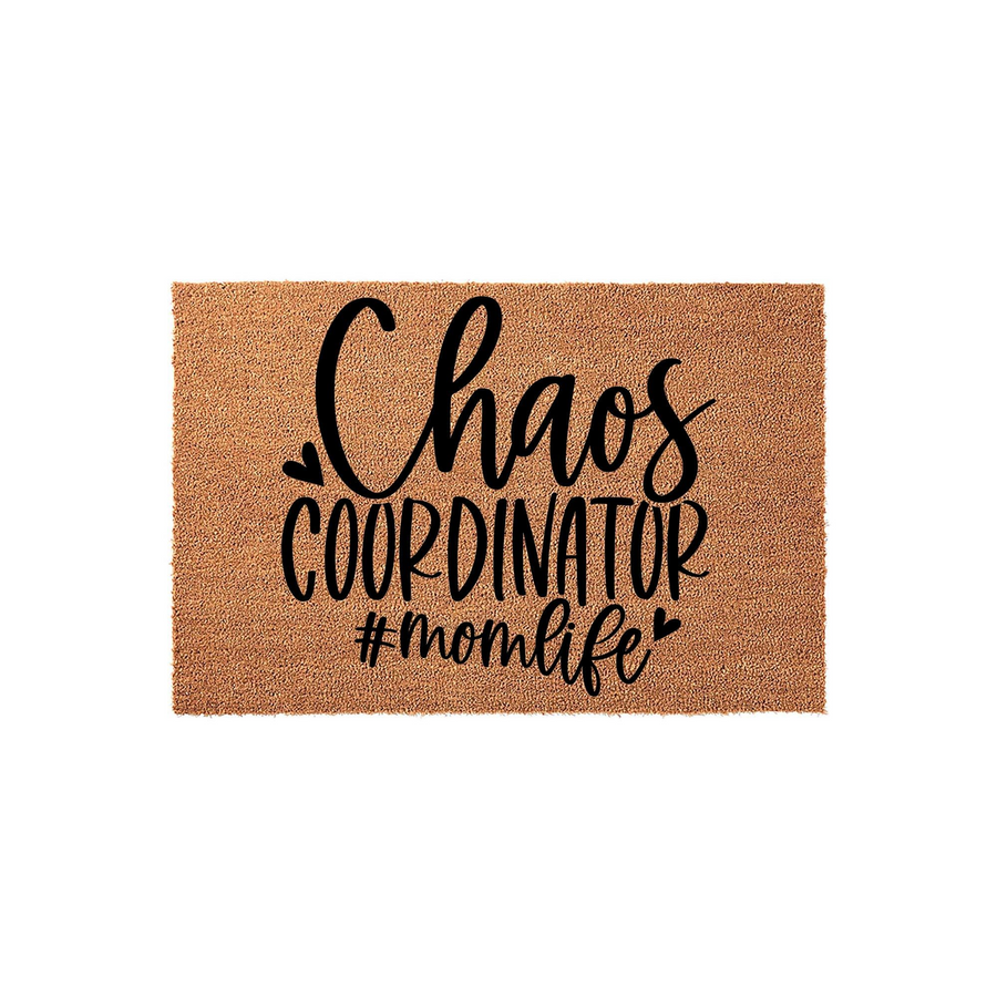 Chaos Coordinator Momlife Doormat featuring a natural coir texture with bold black lettering that reads Chaos Coordinator #momlife, creating a fun and welcoming entryway decor piece for any busy household front porch or home