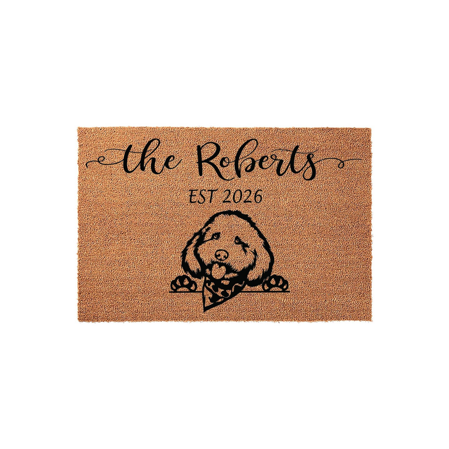 Personalized Goldendoodle Dog Doormat featuring a cute illustrated dog wearing a bandana, customized with a family name and established year on a natural coir fiber background for a welcoming front porch entrance.
