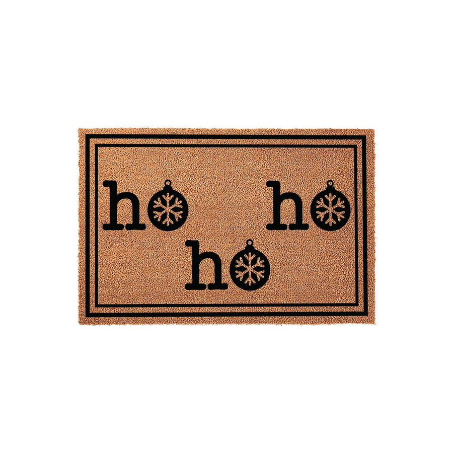 Ho Ho Ho Christmas Coir Doormat featuring a natural brown fiber texture with black text and festive ornament graphics replacing the letter O, framed by a simple black border on a clean white studio background for holiday decor.