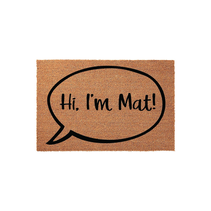 Funny Hi I'm Mat coir doormat featuring a large black speech bubble graphic printed on a natural brown coconut fiber surface, creating a clever and welcoming entryway decor piece for your front porch or home entrance.