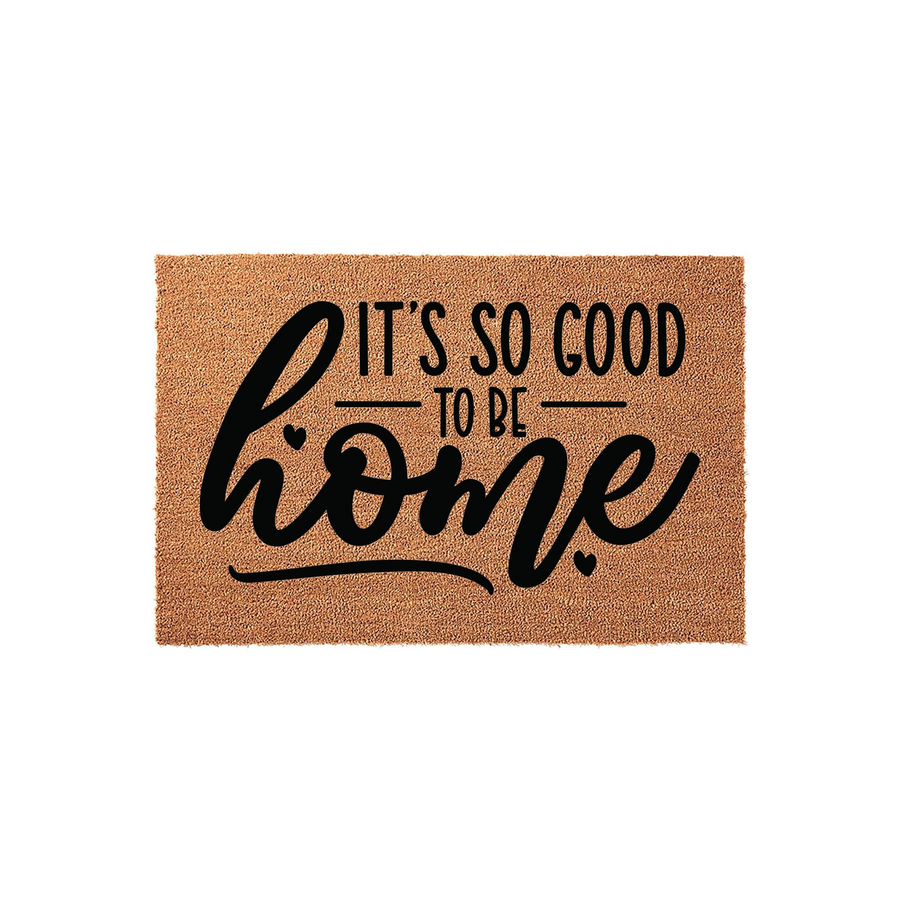 It's So Good To Be Home coir doormat featuring a natural brown fiber texture and bold black typography that welcomes guests to your front porch with a warm and inviting message for any entryway or housewarming gift.
