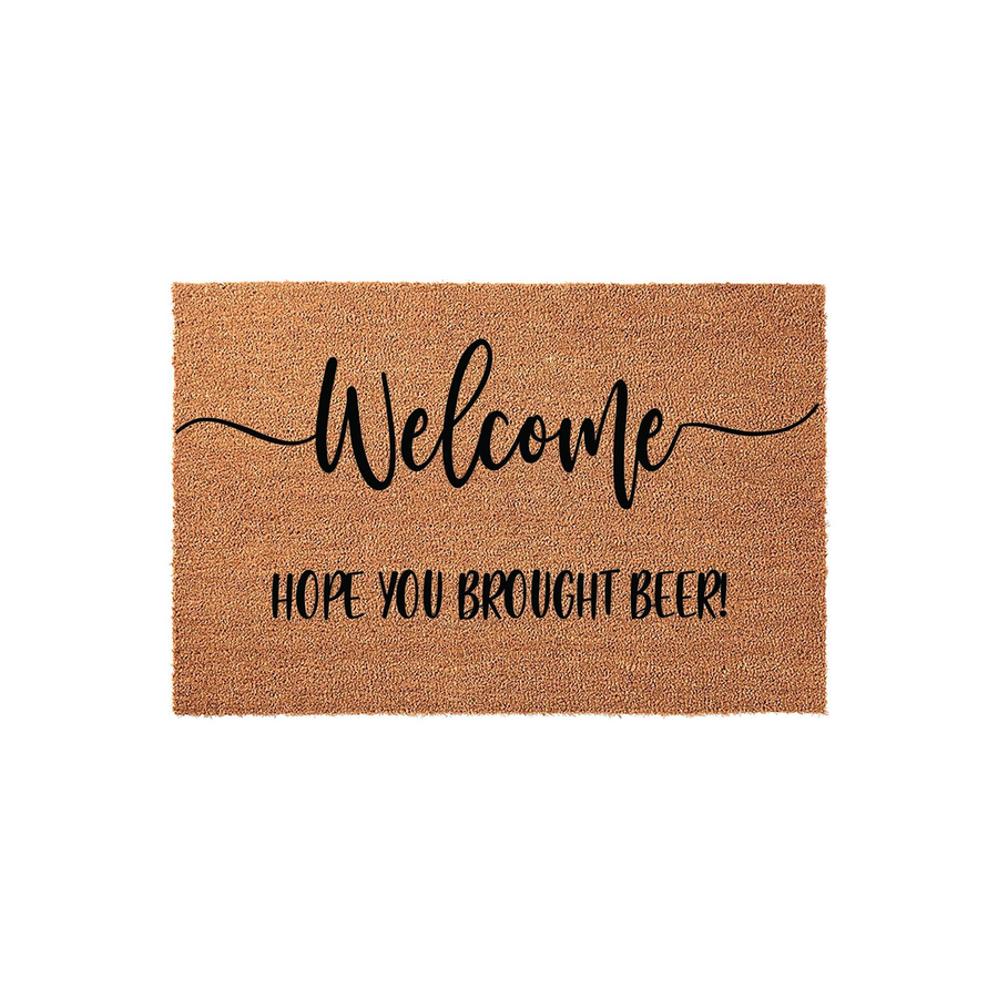 Funny Welcome Doormat with the text Hope You Brought Beer printed in black script and block lettering on a natural brown coir fiber mat, creating a humorous and inviting entryway decor piece for your front porch or home entrance.
