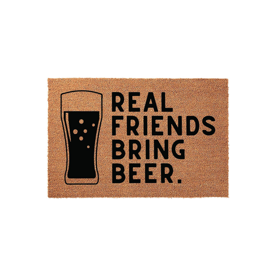 Real Friends Bring Beer coir doormat featuring a black graphic of a pint glass filled with beer, set against a natural tan textured background that makes a fun and welcoming addition to any front porch or entryway decor.
