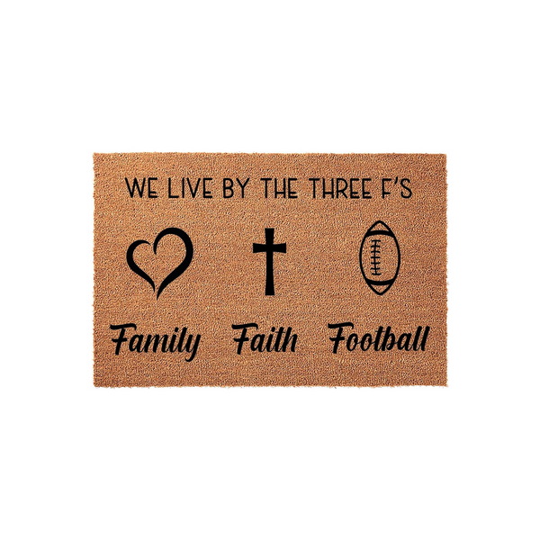 Family Faith Football coir doormat featuring a natural tan fiber texture with black printed icons of a heart, a cross, and a football, celebrating the three F's in a clean, modern design for a welcoming front porch entrance.
