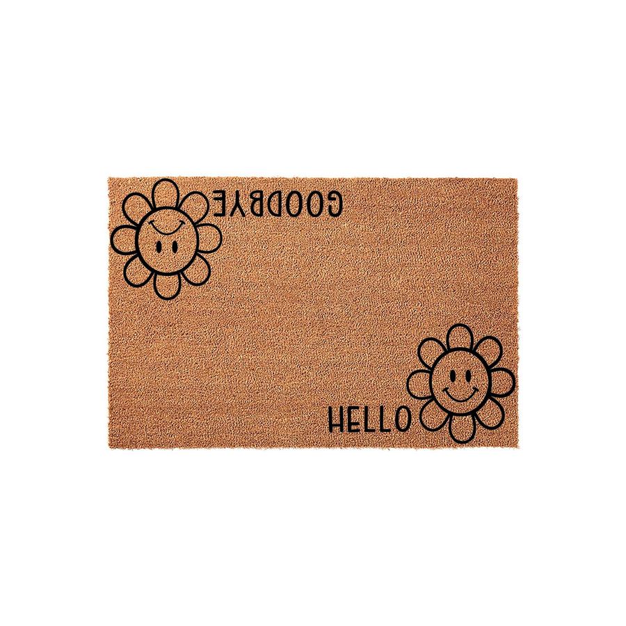 Smiley face flower coir doormat featuring a natural brown fiber texture with black printed graphics, displaying a cheerful Hello on one side and a Goodbye on the other for a fun and welcoming entryway decor piece for your front