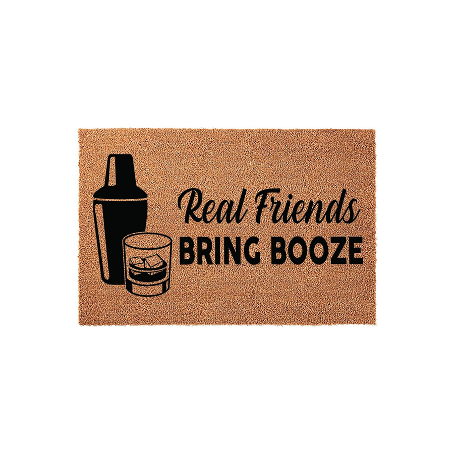 Real Friends Bring Booze coir doormat featuring a black graphic of a cocktail shaker and a glass of whiskey with ice, set against a natural tan textured background for a fun and welcoming front porch entrance decor statement
