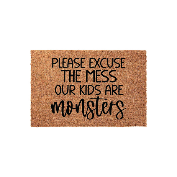 Funny Please Excuse The Mess Our Kids Are Monsters doormat made of natural coir fiber with a durable backing, featuring bold black lettering that adds a humorous and welcoming touch to any front porch or entryway decor.