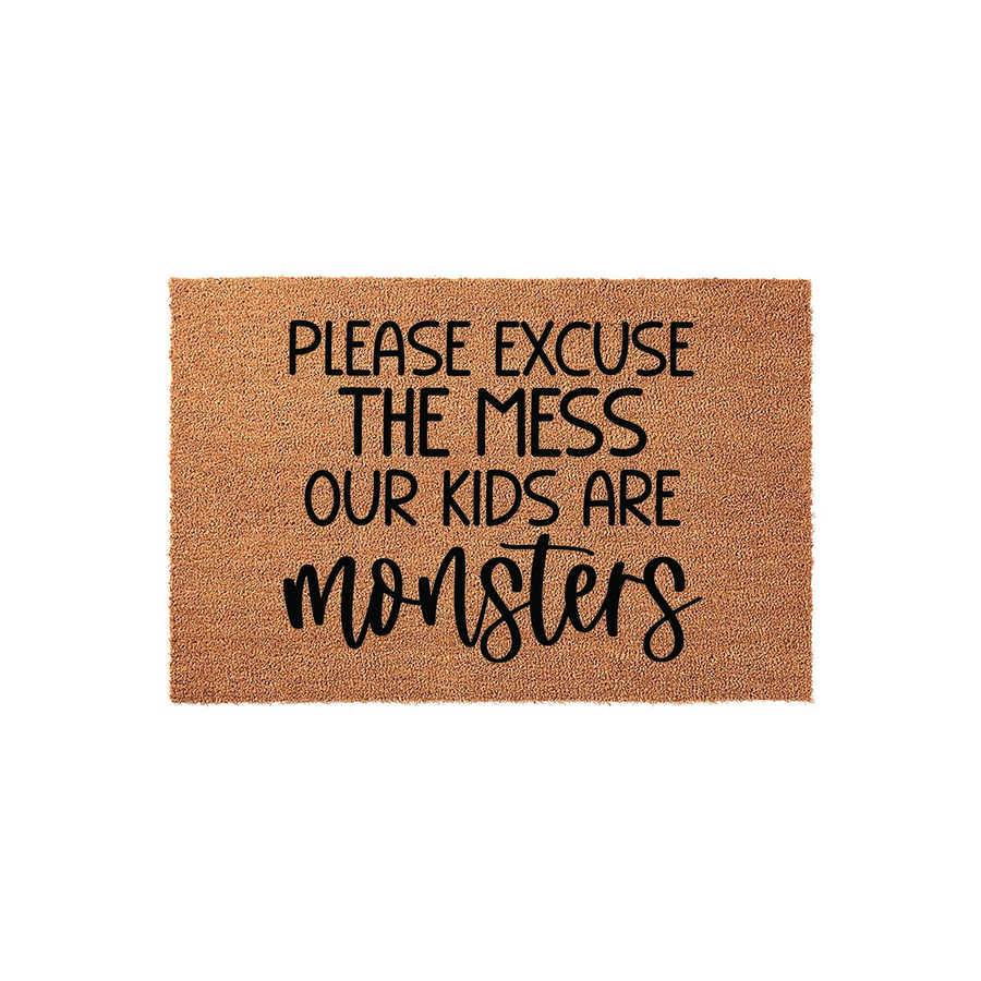 Funny Please Excuse The Mess Our Kids Are Monsters doormat made of natural coir fiber with a durable backing, featuring bold black lettering that adds a humorous and welcoming touch to any front porch or entryway decor.