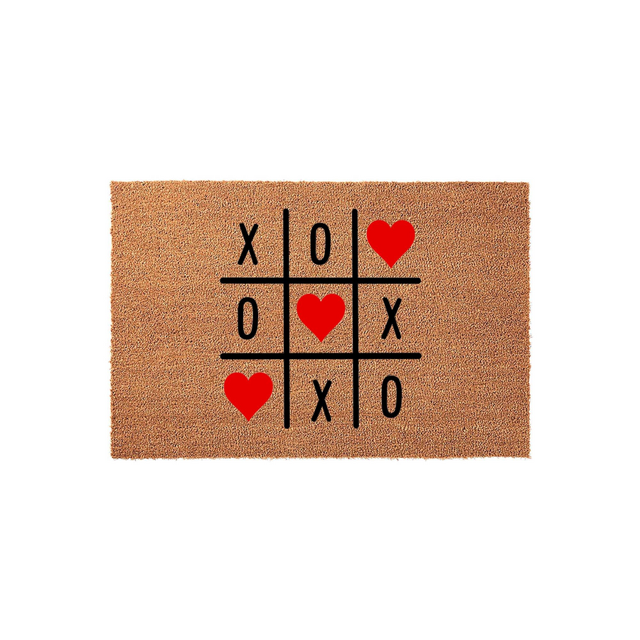 Tic Tac Toe Valentine doormat featuring a natural coir texture with a black grid design, red hearts, and X and O symbols printed in the center, creating a festive and romantic entryway decor piece for your home during the holiday