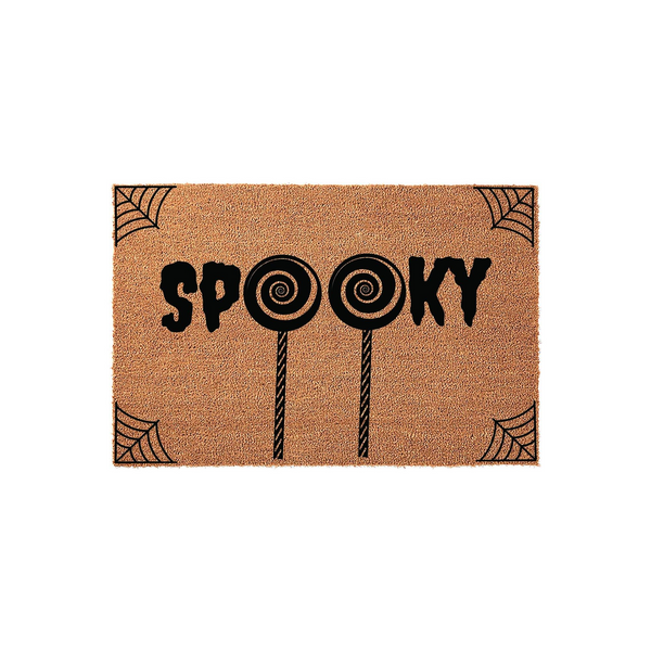 Spooky Halloween doormat featuring a natural coir texture with black text that spells out Spooky, using two lollipop icons for the letter O, and decorative spider web corner accents on a plain white studio background for seasonal