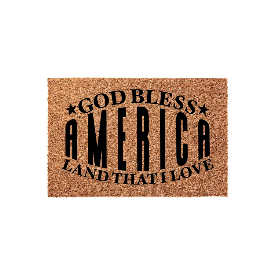 God Bless America patriotic coir doormat featuring bold black text on a natural brown fiber background, perfect for a front porch entryway to show off American pride with a classic, durable, and weather-resistant outdoor floor