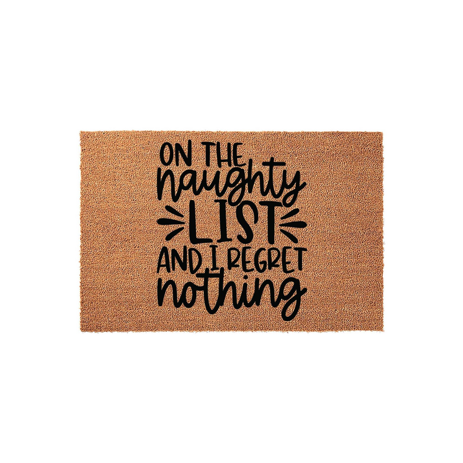 Funny Christmas doormat made of natural coir fiber, featuring the bold black text On the Naughty List and I Regret Nothing, centered on a plain white background for a festive holiday entryway decor piece that adds humor to your