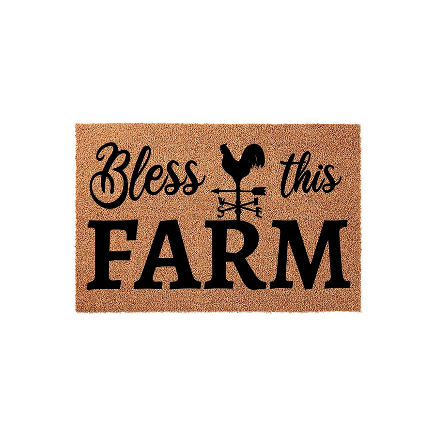 Bless This Farm coir doormat featuring a rustic rooster weather vane graphic and bold black typography on a natural tan fiber background, creating a welcoming farmhouse style entrance for your front porch or home entryway.