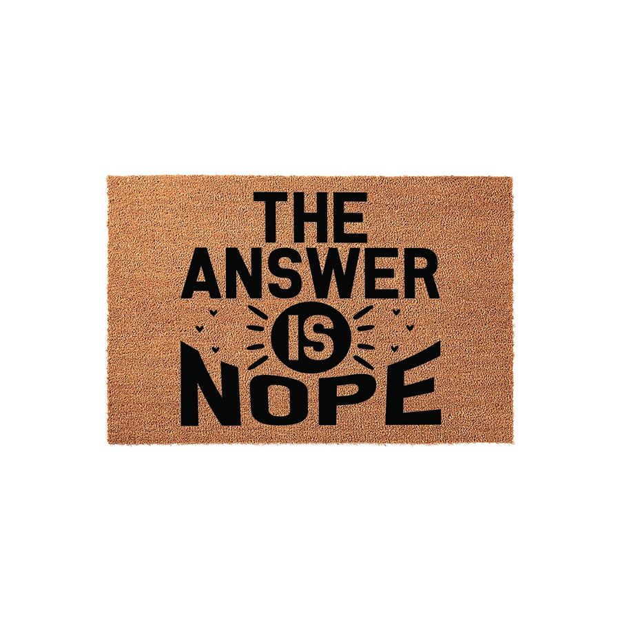 Funny The Answer Is Nope coir doormat featuring bold black typography on a natural brown coconut fiber background, creating a humorous and welcoming entrance piece for your front porch or home entryway decor.