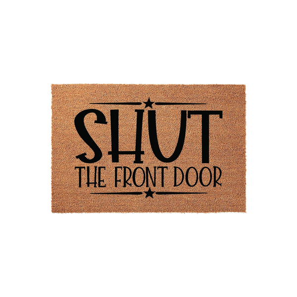 Shut The Front Door coir doormat featuring bold black typography and decorative star accents on a natural tan fiber background, creating a humorous and welcoming entrance mat for your home porch or entryway decor.