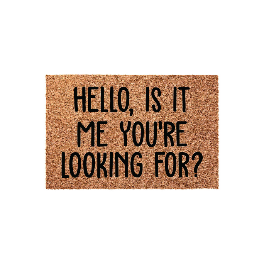 Funny Hello Is It Me You Are Looking For doormat featuring bold black text printed on a natural brown coir fiber mat, creating a humorous and welcoming entrance piece for your front porch or home entryway on a clean white