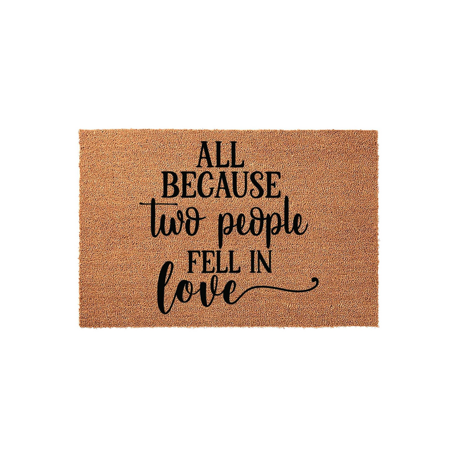 All Because Two People Fell In Love coir doormat featuring a natural tan fiber texture and bold black typography, centered on a clean white background to showcase the romantic message for a front porch or entryway home decor