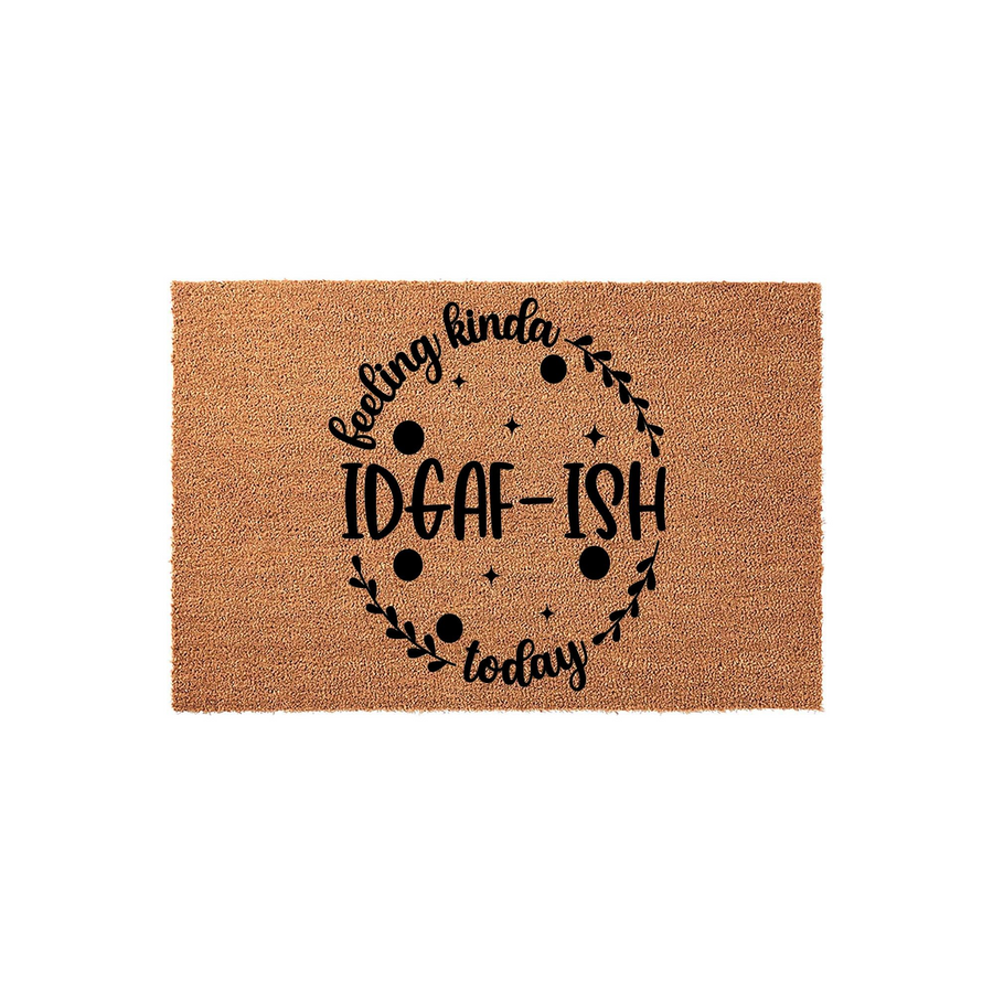 Funny doormat with a natural coir texture featuring the black printed text Feeling Kinda IDGAF-ISH Today inside a decorative circular wreath of leaves and stars, creating a humorous and relatable welcome mat for your front porch