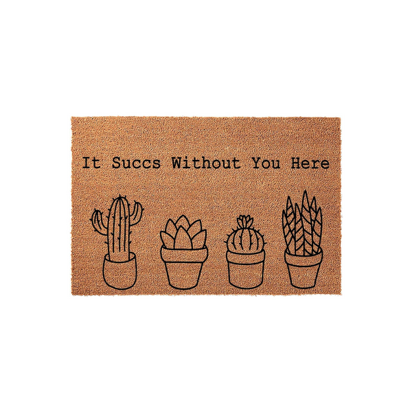 Cactus Welcome Doormat featuring a natural coir texture and a humorous quote that reads It Succs Without You Here, accompanied by four simple black line art illustrations of potted succulents and cacti on a plain white background.