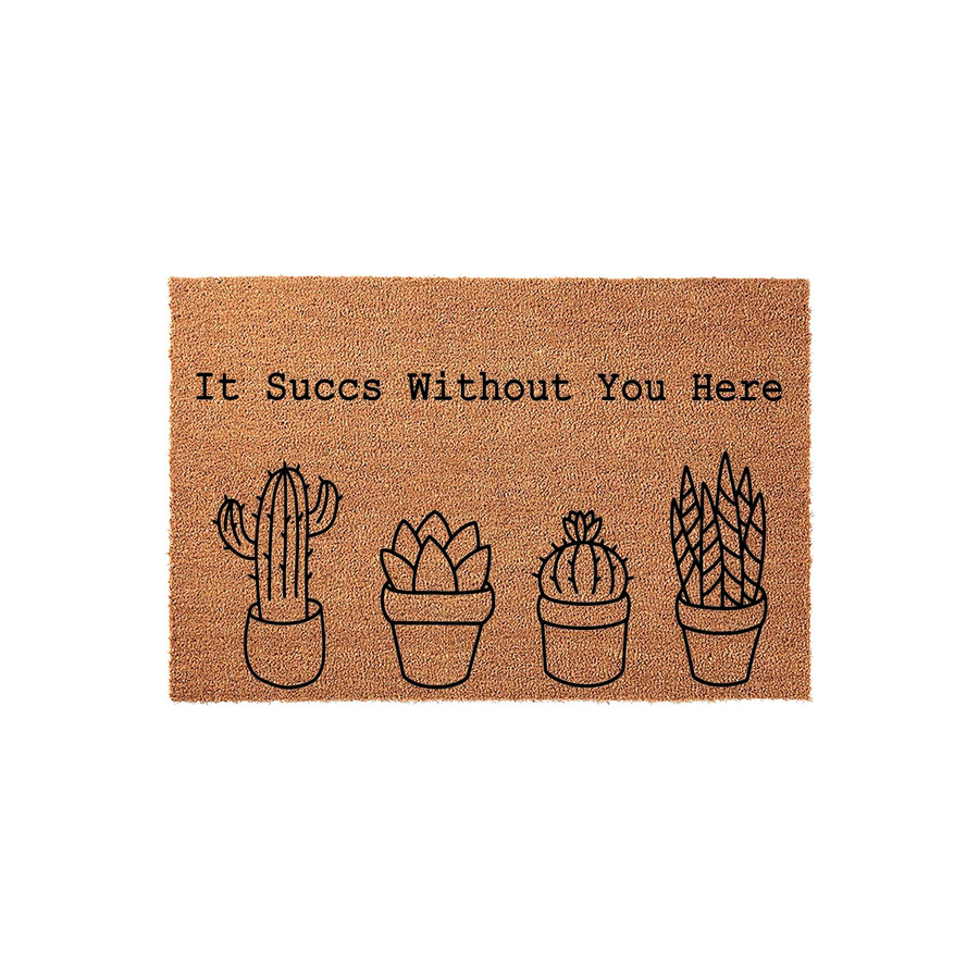 Cactus Welcome Doormat featuring a natural coir texture and a humorous quote that reads It Succs Without You Here, accompanied by four simple black line art illustrations of potted succulents and cacti on a plain white background.