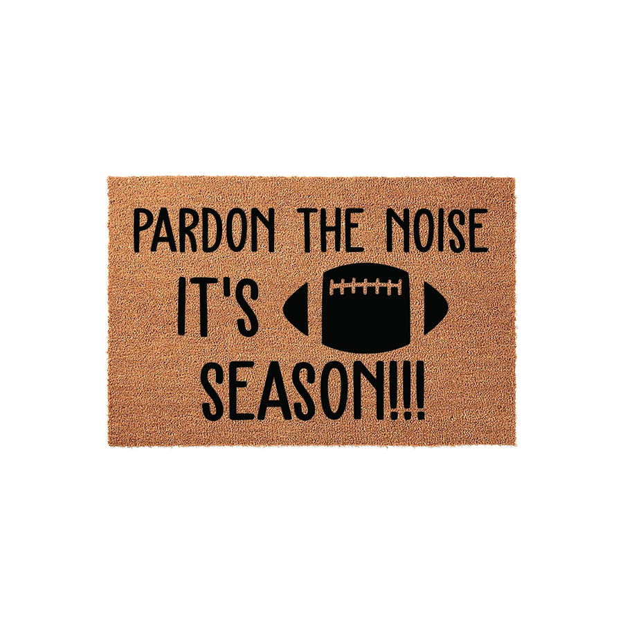 Football Season Doormat featuring a natural coir texture with bold black text that reads Pardon the Noise It's Football Season, complete with a graphic of a football to celebrate game day at your front door entrance.