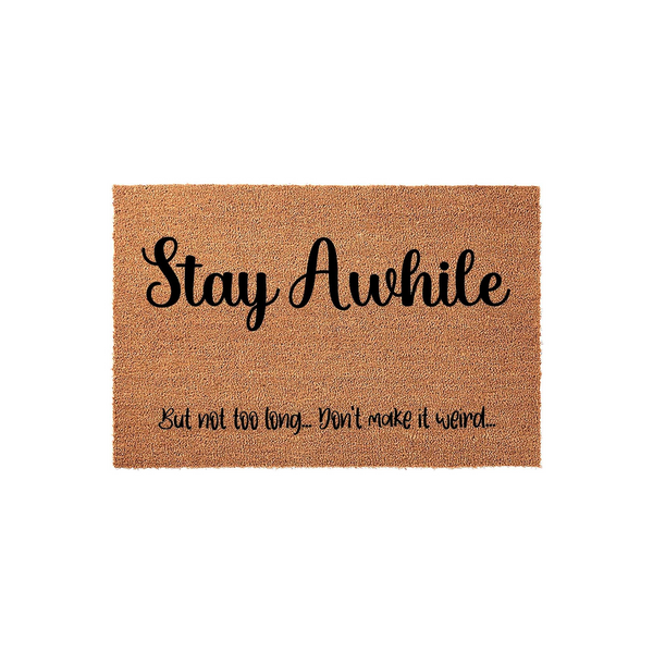 Funny Stay Awhile doormat made of natural coir fiber with a black printed message that reads Stay Awhile but not too long, don't make it weird, perfect for a humorous front porch entryway decor on a plain white studio background.