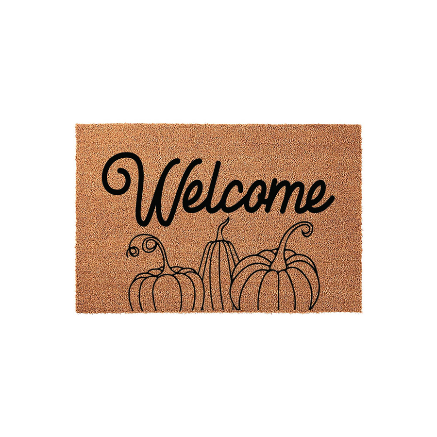 Fall Pumpkin Welcome Doormat featuring a natural coir texture with a black script font that says Welcome above a line art illustration of three pumpkins, creating a festive autumn entryway decor piece for your front porch or home