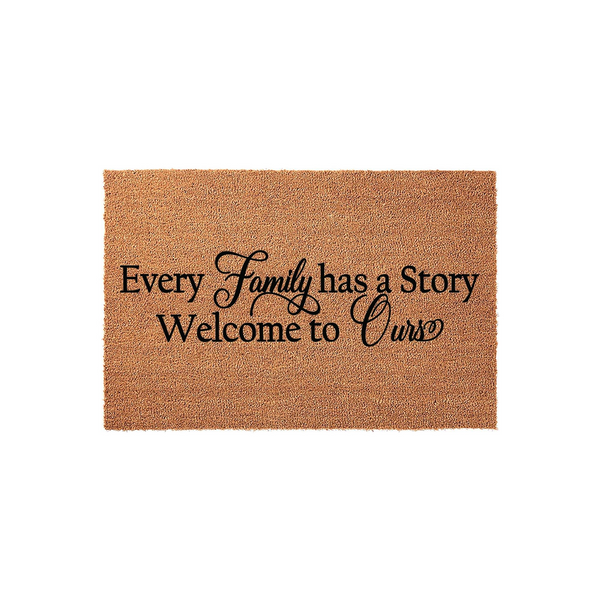 Every Family Has a Story Welcome to Ours coir doormat featuring natural brown coconut fibers and elegant black script lettering, displayed against a clean white background to highlight the inviting front porch decor aesthetic.