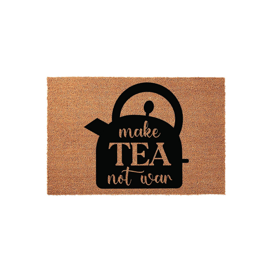 Make Tea Not War coir doormat featuring a black silhouette of a tea kettle printed on a natural brown coconut fiber mat, creating a charming and welcoming entrance decor piece for any tea lover's home or kitchen entryway.