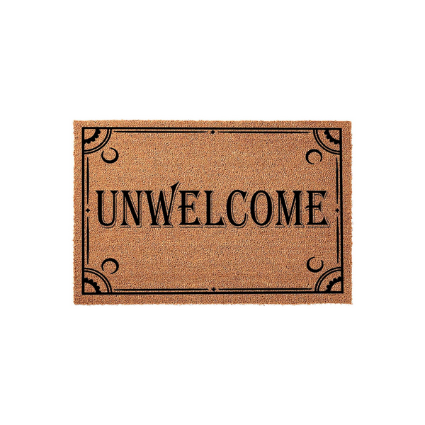 Unwelcome coir doormat featuring a humorous, bold black text design centered on a natural brown fiber mat, framed by elegant decorative corner flourishes that add a touch of gothic style to your front porch or entryway decor.