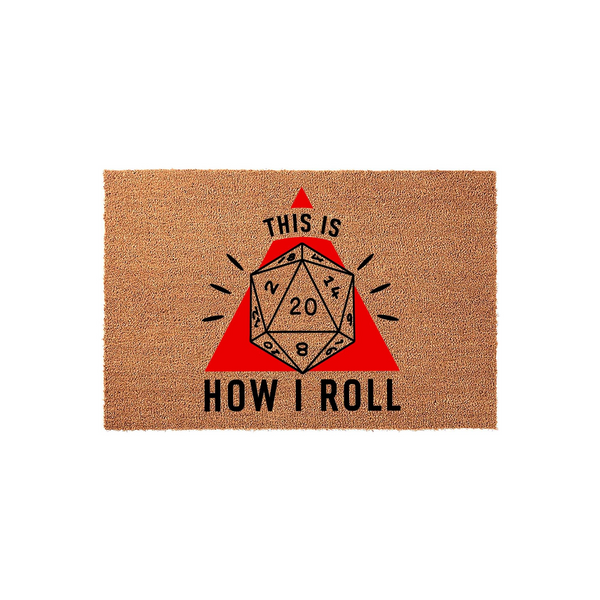 Dungeons and Dragons themed coir doormat featuring a large twenty-sided die graphic centered on a red triangle with the text This Is How I Roll printed in black, creating a fun entryway accent for any tabletop gamer or fantasy