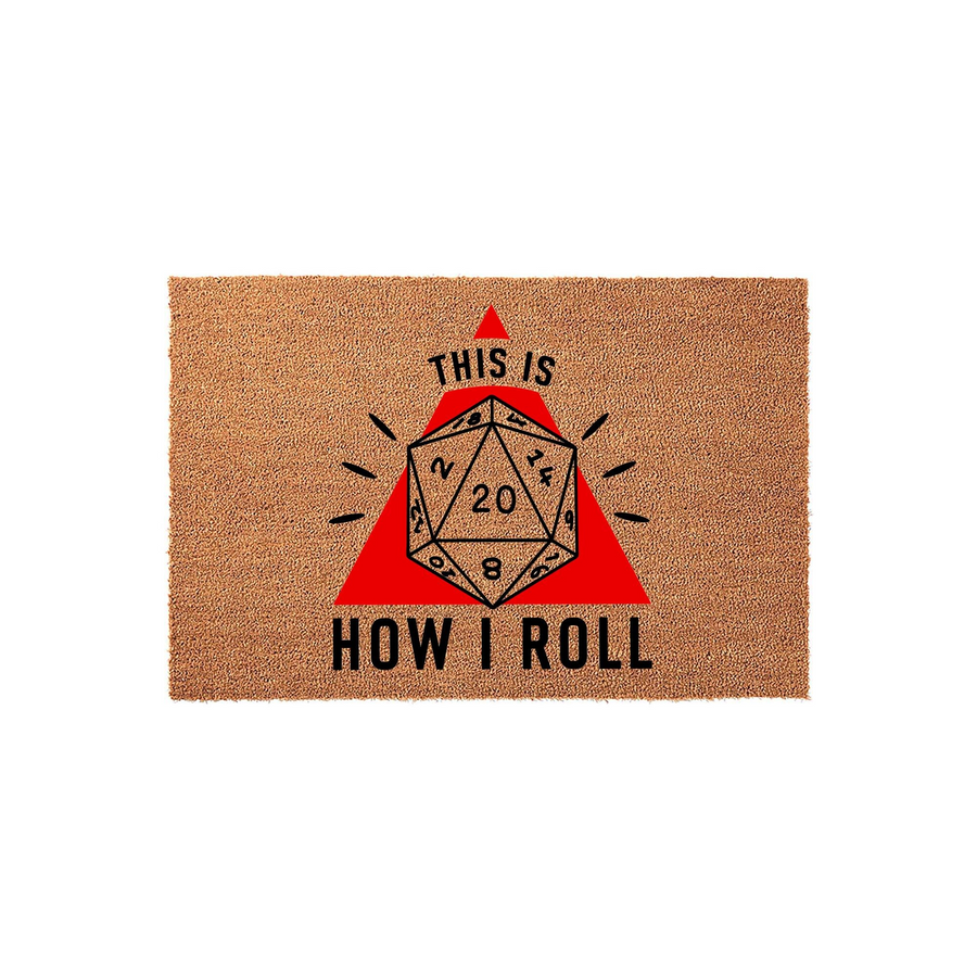 Dungeons and Dragons themed coir doormat featuring a large twenty-sided die graphic centered on a red triangle with the text This Is How I Roll printed in black, creating a fun entryway accent for any tabletop gamer or fantasy