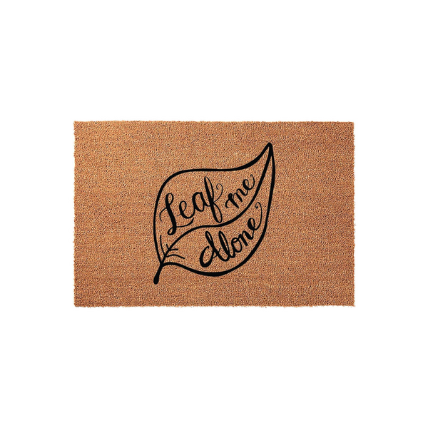 Leaf Me Alone funny coir doormat featuring a large black leaf graphic with elegant cursive lettering centered on a natural brown textured fiber background, creating a humorous and welcoming entrance for any home or apartment