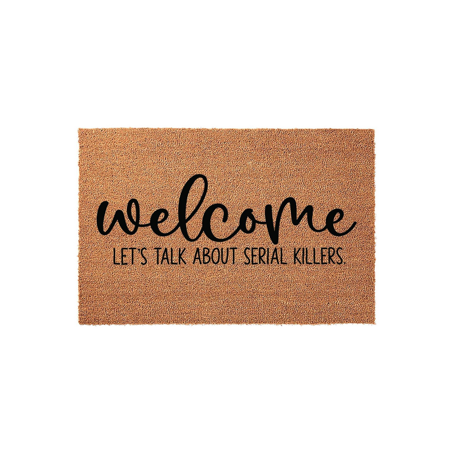 Funny Welcome Doormat featuring the text Welcome Let's Talk About Serial Killers in black script and sans-serif fonts, printed on a natural brown coir fiber mat against a clean white background for a true crime fan home entrance.