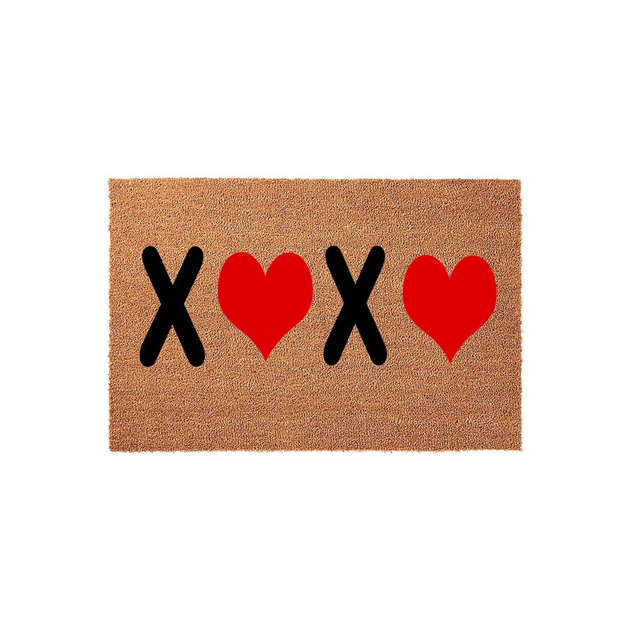 XOXO Valentine Doormat featuring a natural coir texture with bold black letters and bright red hearts printed in a repeating pattern, creating a festive and welcoming entryway decor piece for your home during the holiday season.