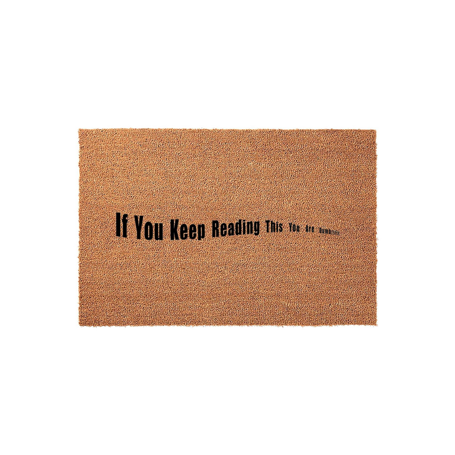 Funny Coir Doormat with the text If You Keep Reading This You Are Dumb printed in black ink on a natural brown fiber surface, featuring a humorous design that makes for a witty and sarcastic welcome mat for your front porch or