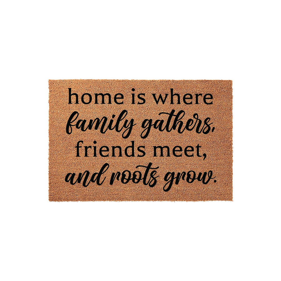 Home Is Where Family Gathers doormat featuring a natural coir texture and black printed text that reads home is where family gathers, friends meet, and roots grow, creating a welcoming entrance for any front porch or entryway.
