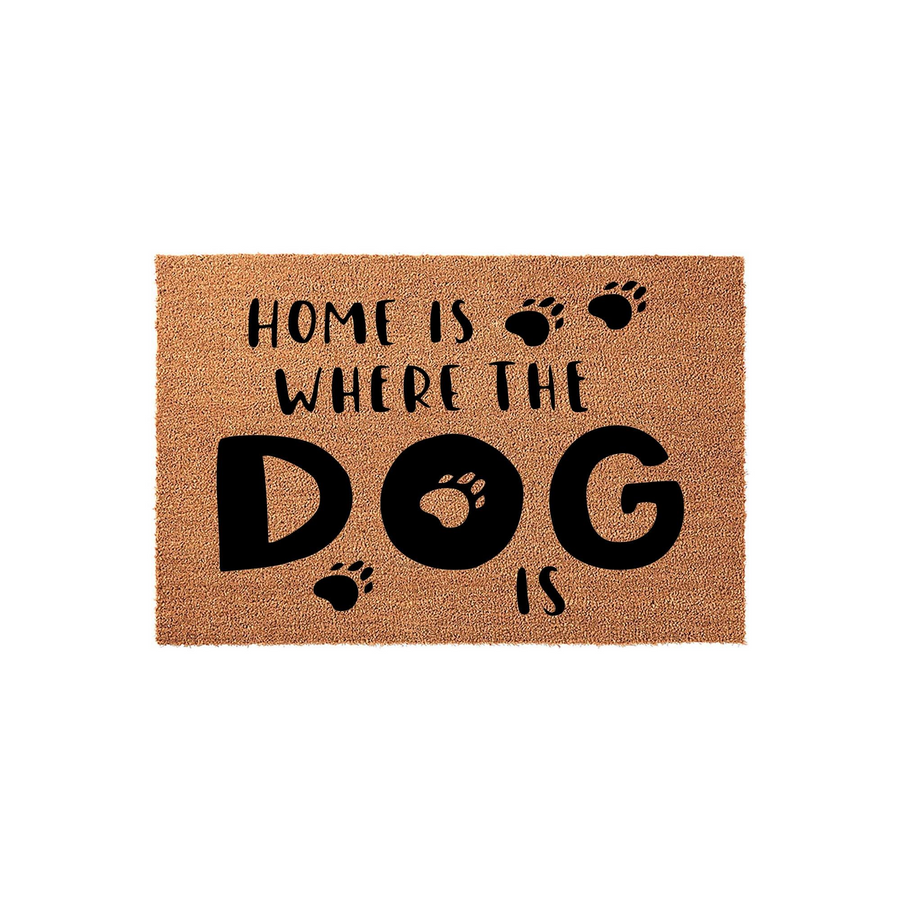 Home Is Where The Dog Is coir doormat featuring a natural brown fiber texture and bold black lettering with cute paw print accents, creating a charming entryway decor piece for any pet lover looking to welcome guests to their