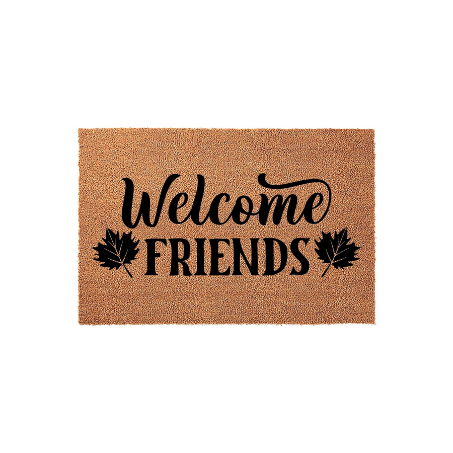 Fall Welcome Friends coir doormat featuring a natural tan fiber texture with black script lettering and decorative maple leaf accents on each side, creating a cozy autumn entryway aesthetic for your front porch or home entrance