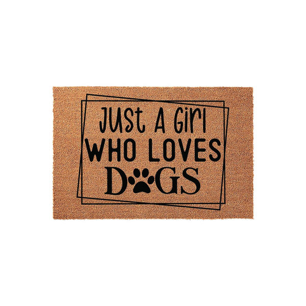 Just A Girl Who Loves Dogs coir doormat featuring a natural tan fiber texture and bold black text with a paw print replacing the letter O, set against a clean white background for a modern and welcoming entryway decor style.