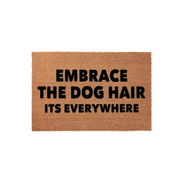 Funny Dog Lover Doormat featuring a natural coir texture with bold black text that reads Embrace The Dog Hair Its Everywhere, making it a humorous and practical home decor accessory for any pet owner who loves their furry canine
