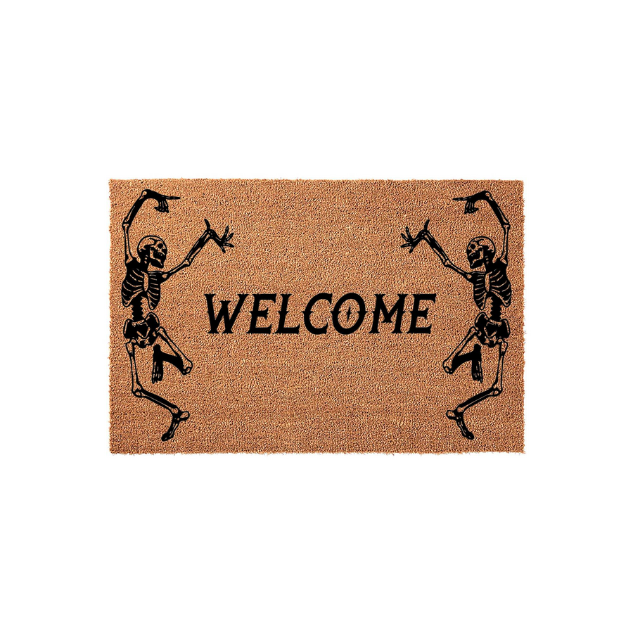 Skeleton Welcome Doormat featuring two dancing black skeletons on a natural tan coir background, with the word Welcome printed in a bold, spooky font to create a festive Halloween entryway decor piece for your front porch or home