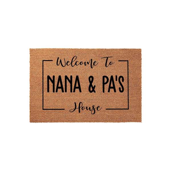 Personalized Nana and Pa's House coir doormat featuring a natural brown fiber texture with black text inside a simple rectangular border, creating a welcoming entryway decor piece for a grandparent's home on a clean white