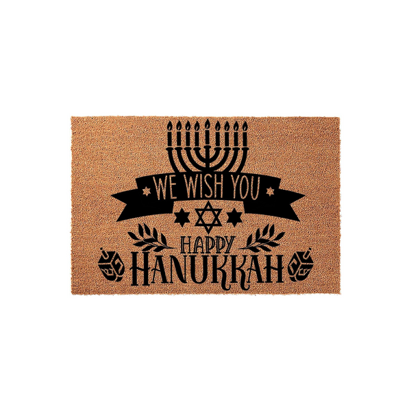 Hanukkah coir doormat featuring a black printed design of a menorah, a Star of David, and dreidels with the text We Wish You Happy Hanukkah, set against a natural tan textured fiber background for a festive holiday entryway